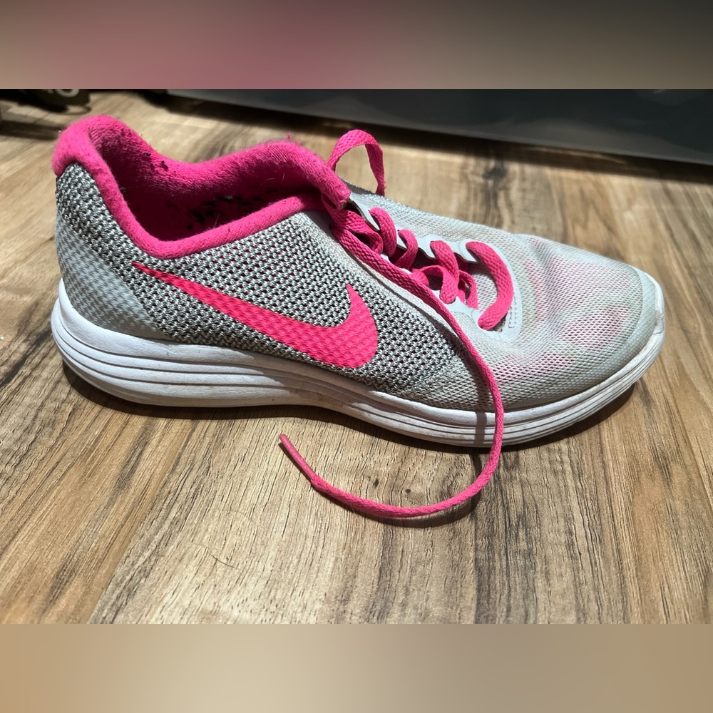 Nike running shoe. Worn only a few times. Size 4Y